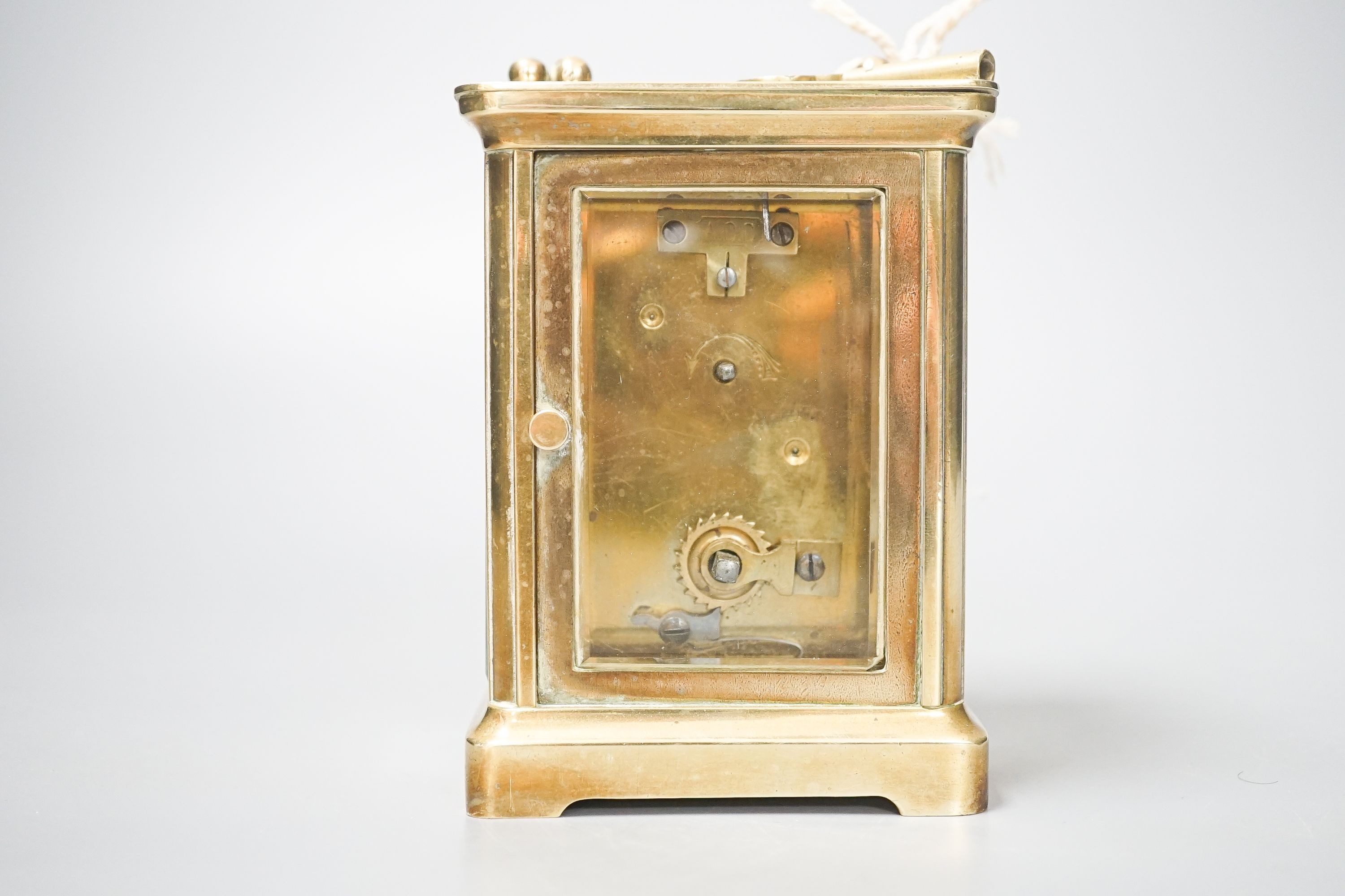 An early 20th century lacquered brass carriage timepiece, 10.5cm